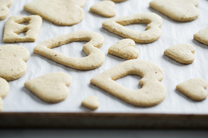 Heart shaped sugar cookies on baking sheet